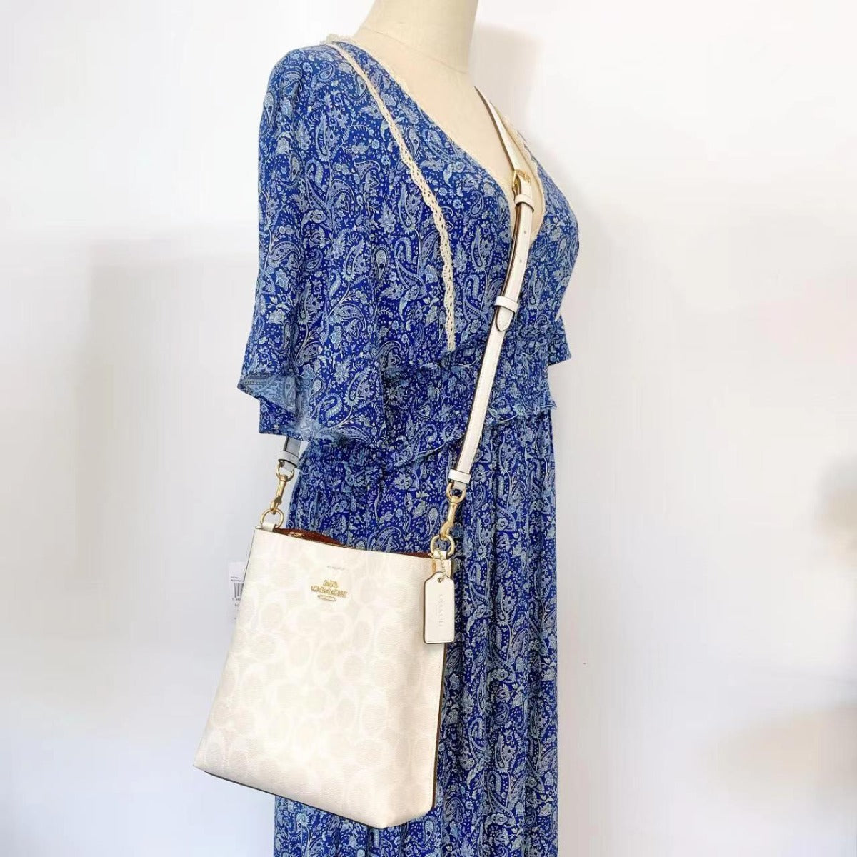 Coach CA582 Mollie Bucket Bag 22 In Signature Canvas In Gold/Chalk/Glacierwhite Coach CA582 Mollie Bucket Bag 22 In Signature Canvas In Gold/Chalk/Glacierwhite